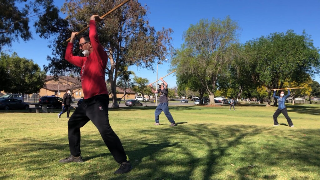 Sensei demonstrating one of the 20 jo suburi, or solo exercises - katate gedan, gaeshi